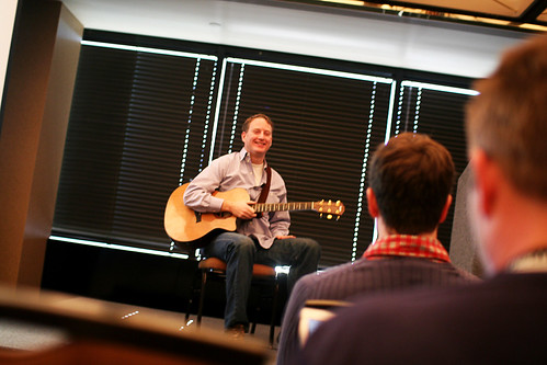 Dan on stage with guitar
